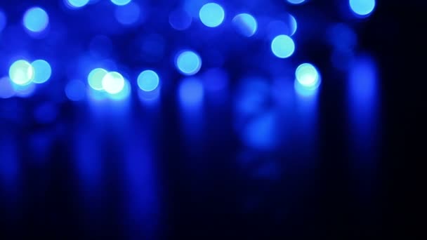 Abstract blue background with defocused lights, blurred light motion bokeh effect — Stock Video