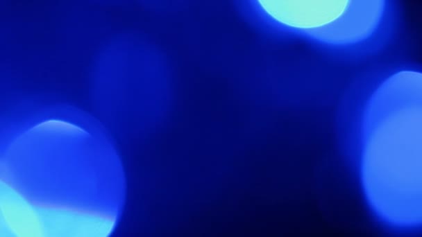 Streszczenie niebieskie tło z rozmyte światła, rozmycie światła ruch bokeh efekt — Wideo stockowe
