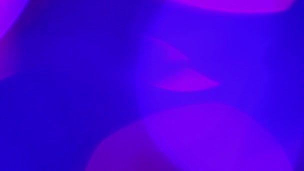 デフォーカスライト、ぼやけたライトモーションボケ効果を持つ抽象的な青い背景 — ストック動画