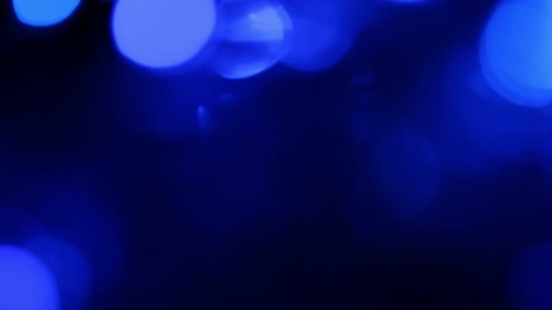 Абстрактный синий фон с размытым светом, размытым боке-эффектом движения света — стоковое видео