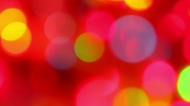 Kırmızı defokus ışıkları, soyut kırmızı hareket arka planlar, bulanık ışık bokeh etkisi