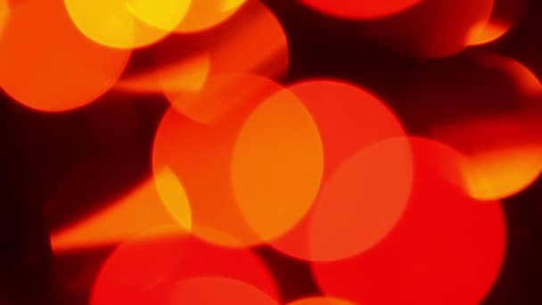 Червоні дефокусовані вогні, абстрактні червоні фони руху, розмиті світлові боке ефект — стокове відео