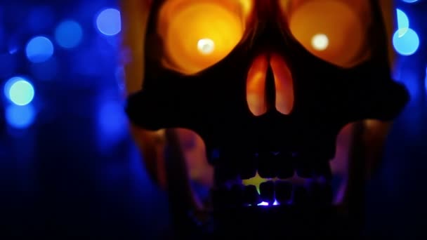 Skull and abstract blue background - defocused lights, blurred light effect — Stock Video