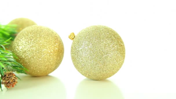 Christmas gold balls and tree on white background — Stock Video