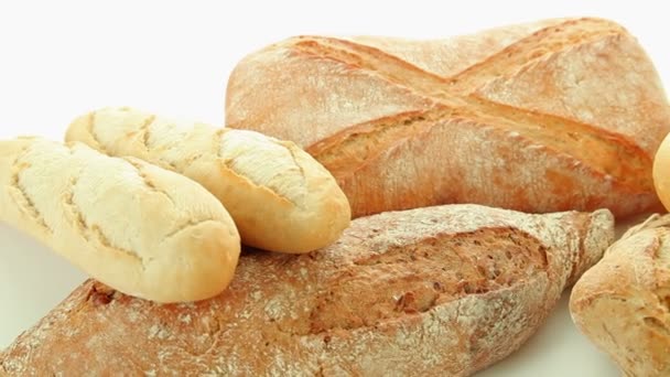 Fresh baked group of different bread products — Stock Video