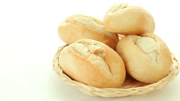 Fresh baked bread rolls in basket — Stock Video