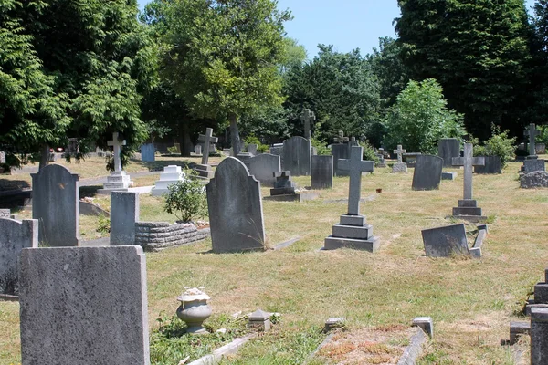 Cemetery graveyard halloween stone graveyard headstones and tombs — Stock Photo, Image