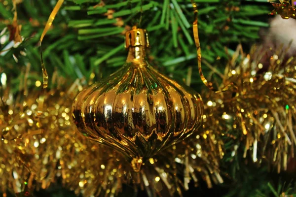 Christmas decorations for tree in gold glitter and red — Stock Photo, Image