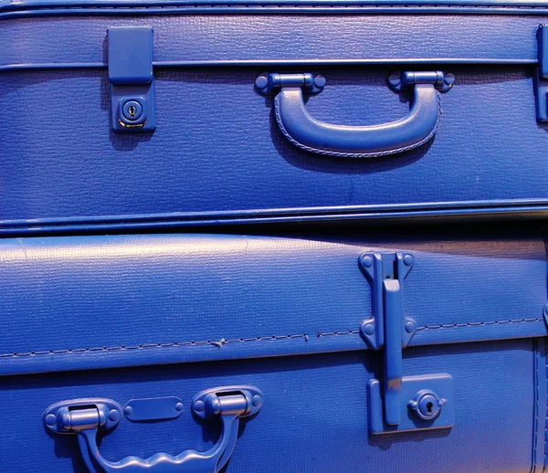 Blue stacked vintage style suitcases — Stock Photo, Image