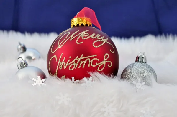 Christmas baubles with fake snow flakes stars and red decorations — Stock Photo, Image