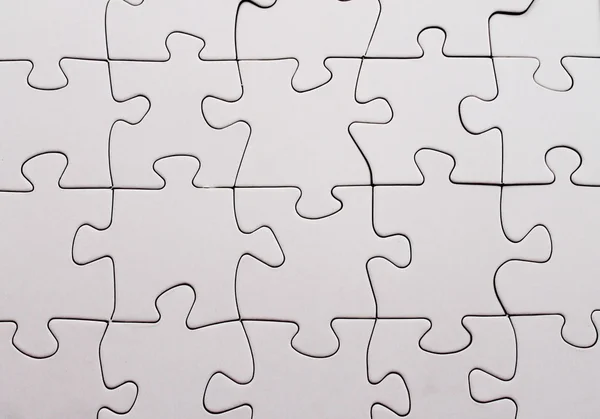 Blank completed jigsaw — Stock Photo, Image