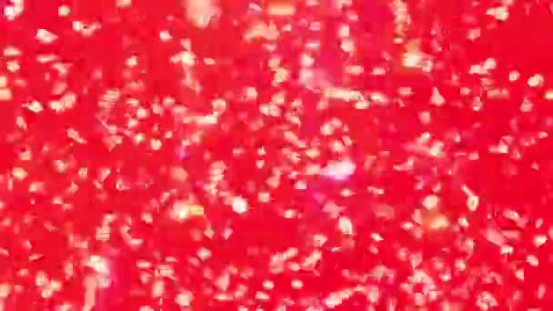 červená růžová Abstraktní pohyb bokeh pozadí zářící částice. Třpytivé třpytivé částice s Bokeh. Oblíbené, moderní, Vánoce, Nový rok, prázdniny, svatební zázemí