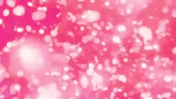 ピンクの抽象的な動きボケの背景に輝く粒子 ボケでキラキラ光る記事をつぶやく 人気のある 現代的な クリスマス 結婚式の背景 — ストック動画