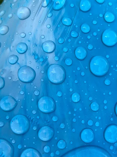 Water Druppels Blauwe Cyaan Turquoise Plastic Achtergrond Met Kopieerruimte — Stockfoto