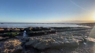 Hastings, East Sussex, UK, June 13, 2022. Footage of the beach of pebbles landscape