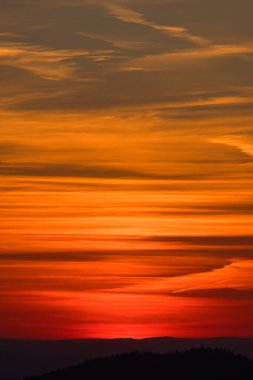 Sunset in the Bavarian Forest. Orange-red sky. View from mount Grosser Arber. Lamer Winkel, Bavarian Forest, Upper Palatinate, Bavaria, Germany.