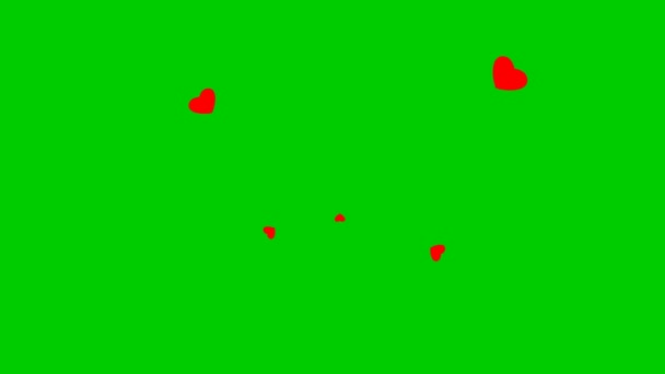 赤いハートのアニメーションの背景が中心から飛びます 愛の概念 緑の背景に隔離された心 — ストック動画