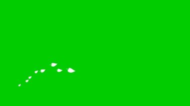 Animated white leaves fly from left to right. Looped video. A wave of flying leaves on green background.