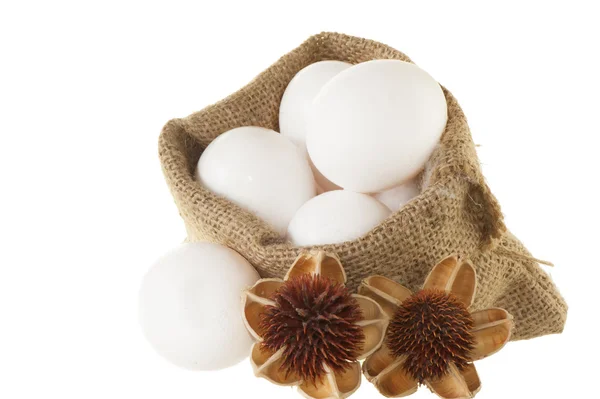 Natural basket with eggs — Stock Photo, Image