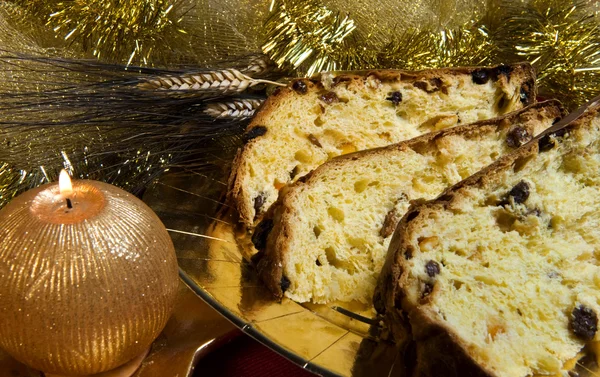 Cake and candle with Christmas decorations — Stock Photo, Image