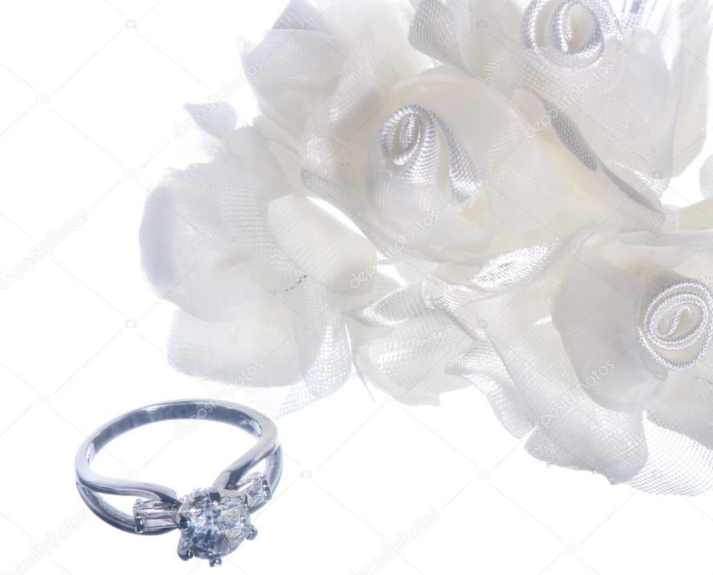 isolated wedding ring and  favors