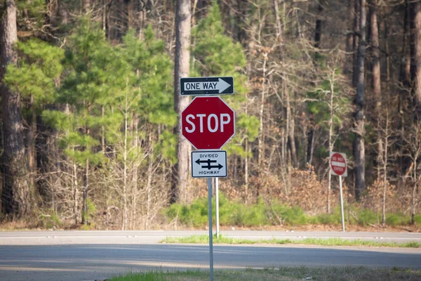 One Way Stop Sign Divided Highway Signs Forest Background — Stock Photo, Image