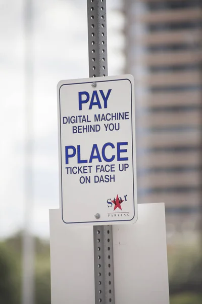 DALLAS, TEXAS - June 8, 2014: Pay to park sign in Dallas,Texas, taken June 8, 2014