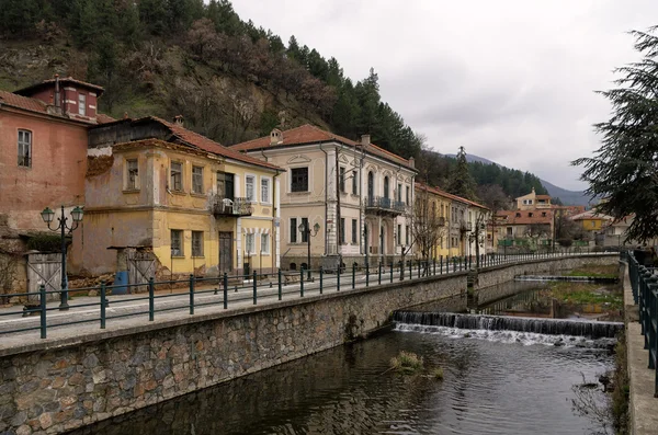 Old neoclassical buildings by the river in Florina, Greece — Stock Photo, Image