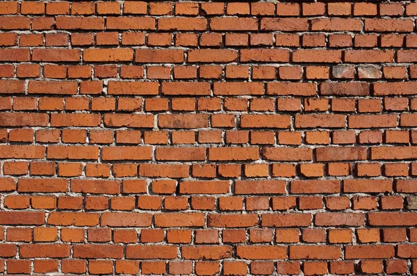 Kırmızı tuğlalı ev duvarı