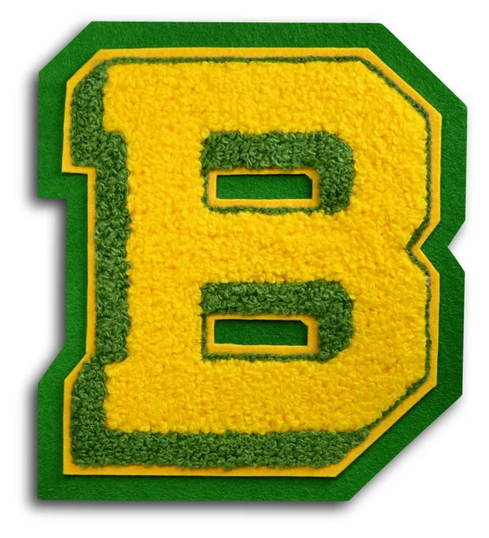 Fotografi av skola sport brev - grön och gul b — Stockfoto