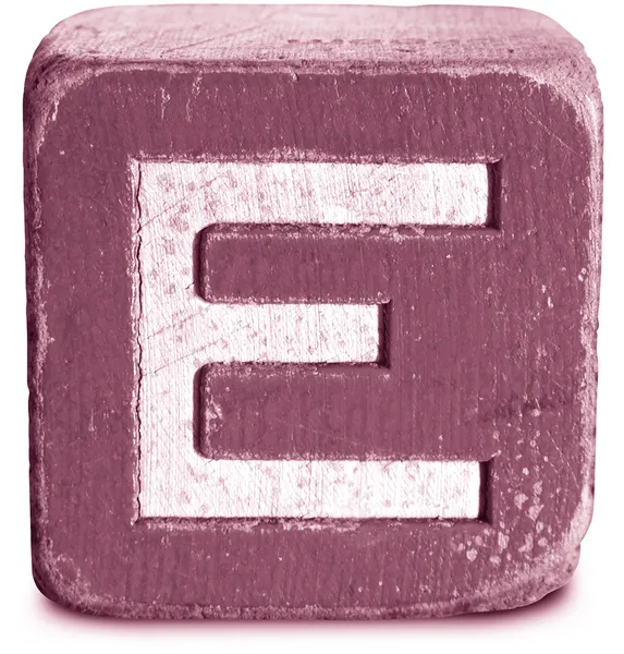Fotografie purpurové dřevěných tiskací písmeno e — Stock fotografie