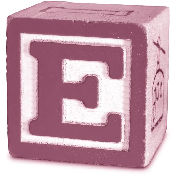 Фото Magenta Wooden Block Letter E — стоковое фото