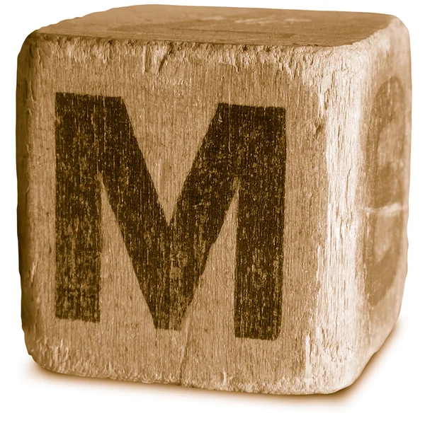 Fotografie sépiový dřevěných tiskací písmeno m — Stock fotografie