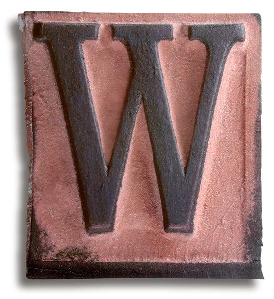 Фіолетовий гумовий штамп літера W — стокове фото