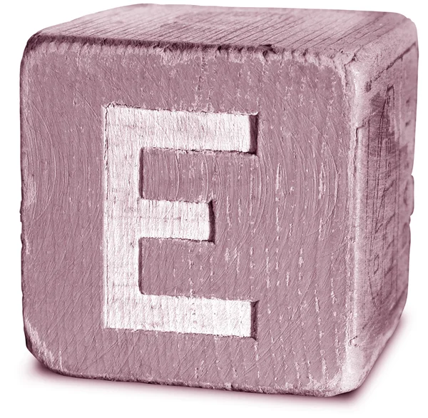 Fotografie purpurové dřevěných tiskací písmeno e — Stock fotografie