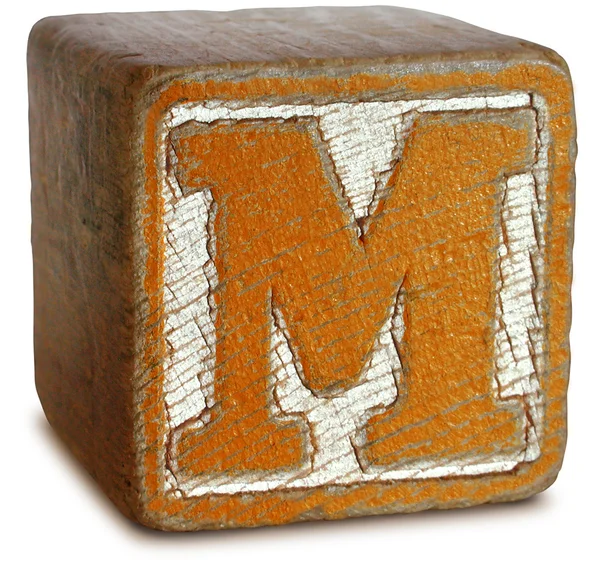 Foto van Oranje houten blok letter m — Stockfoto