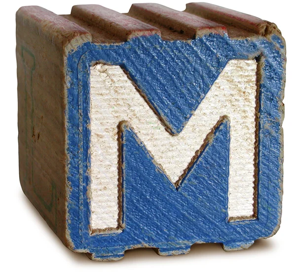 Fotografie modré dřevěné tiskací písmeno m — Stock fotografie