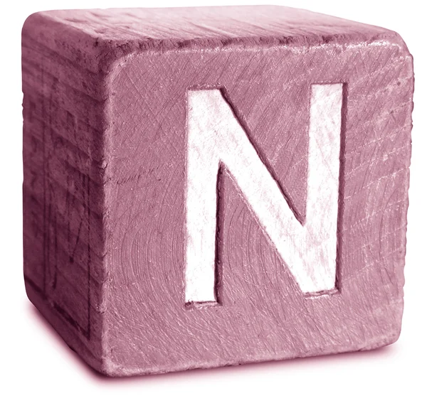 Фото Magenta Wooden Block Letter N — стоковое фото