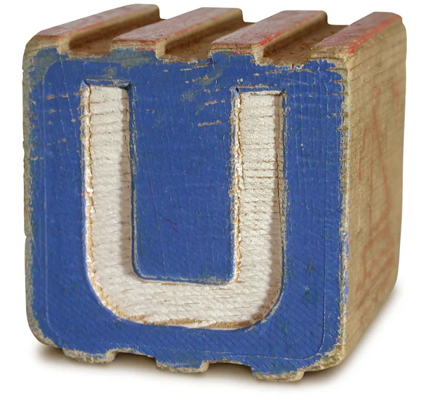 Фотография буквы U в синем вудене — стоковое фото