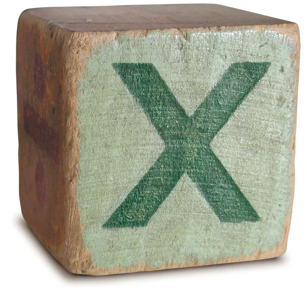 Фотография письма зеленого деревянного блока X — стоковое фото