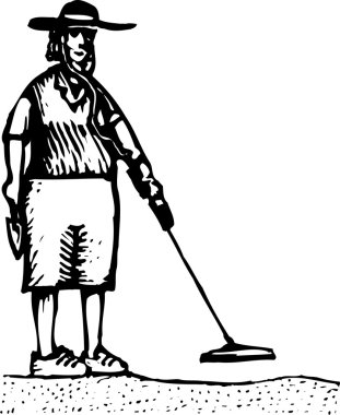 Metal dedektörü kullanan kadın