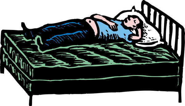 Man Lying on Bed in Showroom