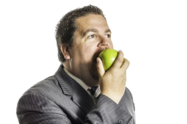 Äter ett äpple — Stockfoto