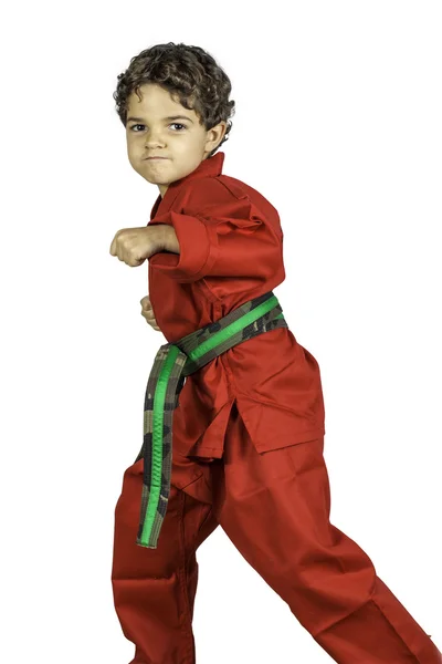 Młody chłopak w jednolity czerwony karate — Zdjęcie stockowe