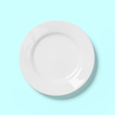 boş beyaz kase mavi arkaplanda izole.