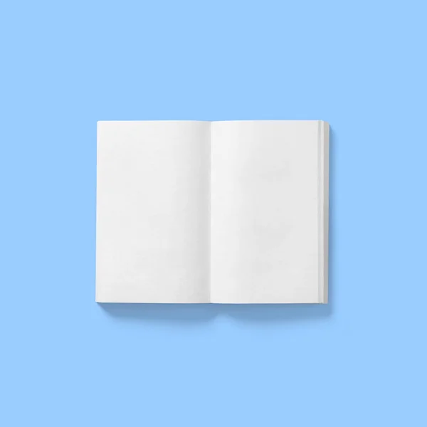 学校の概念に戻る ハードカバー空白の白い本の真ん中を開く青に隔離された — ストック写真