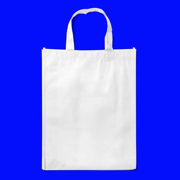 袋装毛织物购物袋模型 蓝色背景隔离 — 图库照片