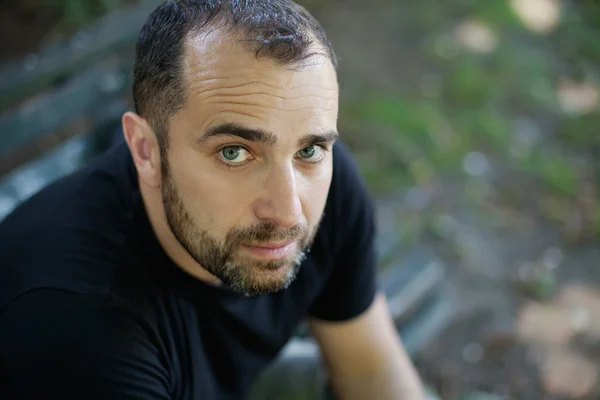 Portrait of man Sitting in the Park — Stock Photo, Image