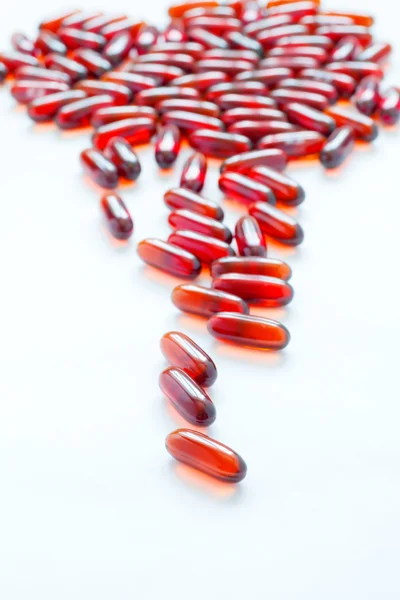 Scattering of red tablets — Stock Photo, Image