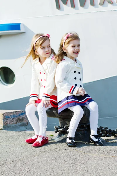 Two little happy girls in port — Stock Photo, Image